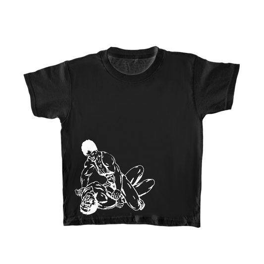 PANCHEEWA black baby tee with white screen-printed wrestling graphic, made from 100% organic cotton jersey.