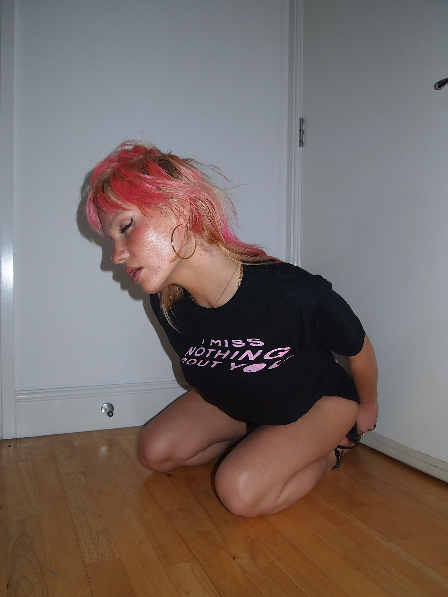 Model wearing PROJECTPANCHEEWA I Miss Nothing About You graphic baby tee